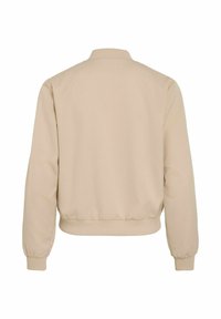 Veste bomber beige à manches longues avec col, poignets et taille côtelés, vue de dos sur fond blanc.