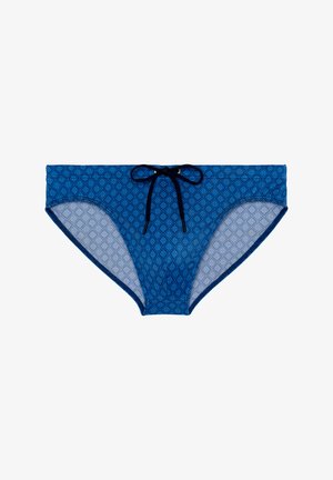 Parte inferior de bikini azul con un diseño geométrico, que cuenta con un cordón tonal azul y un ribete contrastante a lo largo de los bordes.