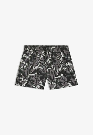 Svartvita blommiga badshorts med en grå bakgrund. Har en elastisk midja och en liten logotag på fållen.