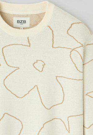 Pull en tricot crème avec de grands motifs floraux délimités en marron clair et un col rond côtelé, étiquette BZB Loose taille L.