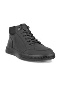 Black mid-top shoes made of smooth leather with a textured black rubber sole. Features contrasting shoelaces and a padded collar.
