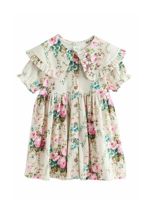 Toddler dress with large ruffled collar, puffed sleeves, button front, and pink, blue, and green floral pattern on cream textured fabric.
