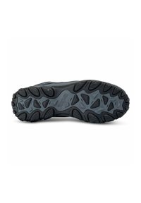 Semelle de chaussure robuste noire et grise avec des motifs de crampons profonds conçus pour la traction en extérieur et l'absorption des chocs.
