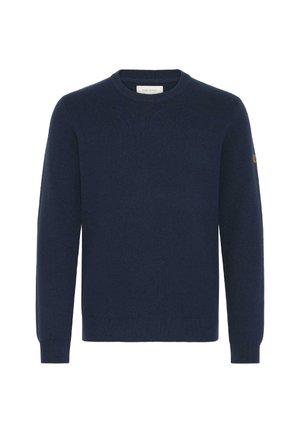 Maglione girocollo blu navy realizzato in tessuto morbido. Presenta maniche lunghe, polsini e orlo a coste, con un piccolo accento color sabbia sulla spalla.