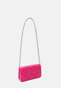 Quilted pink leather crossbody bag with a silver chain strap, rectangular shape, and diamond pattern detailing on the front.
