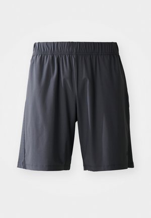 Svarte sportsshorts med elastisk midje og ventilasjonsåpninger på siden, vist mot en hvit bakgrunn.