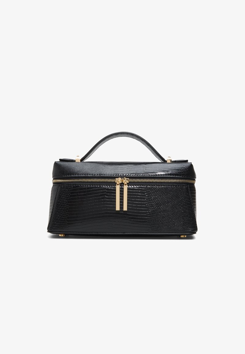 Sac à main en cuir noir texturé avec poignée supérieure, double fermeture éclair dorée et forme rectangulaire structurée sur fond blanc.