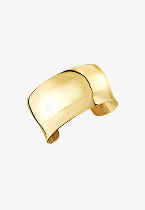 Złoty bransoletka na nadgarstek o wypolerowanej, gładkiej powierzchni. Zakrzywiony kształt, otwarte końce oraz błyszczące wykończenie podkreślają jej elegancki wygląd.