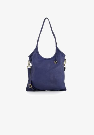 Navy leather tote bag with two shoulder straps, smooth texture, a rounded top, and a small gold logo accent on the front.