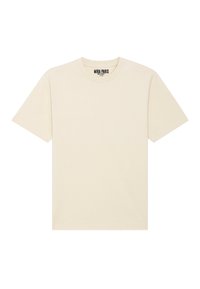 T-shirt en coton de couleur crème avec des manches courtes et un col rond. Il arbore une étiquette de marque "MIRA PARIS" à l'intérieur du col.