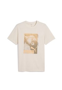 T-shirt in cotone beige chiaro con una grafica di un animale ruggente in toni terrosi e il logo "PUMA" in basso. Maniche corte.