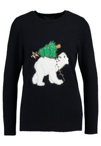 Maglione nero con un orso bianco che trasporta un albero di Natale decorato e indossa luci colorate attorno al collo.