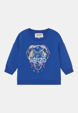 Modrá dětská mikina s dlouhým rukávem, žebrovanými manžetami, patentkami na rameni a vyšívaným vícebarevným logem slona s nápisem "KENZO PARIS".