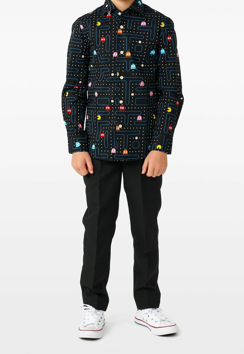 Maglietta a maniche lunghe nera con un motivo grafico colorato di Pac-Man, che presenta fantasmi ed elementi del labirinto, chiusura a bottoni e colletto.