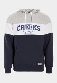 Marineblauer und grauer Hoodie mit vorderer Tasche, weißen und marineblauen Streifen und dem Aufdruck "CREEKS ORIGINAL seit 1974" auf der Brust. Material aus Baumwollmischung.