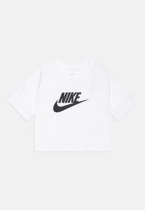 T-shirt bianca croppata in cotone con logo Nike nero stampato sul davanti. Collo rotondo e maniche corte, texture liscia.