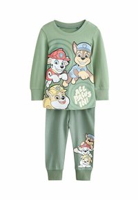Green cotton pajama set featuring long-sleeve top with cartoon dogs and “ALL PAWS IN” text, paired with elastic-waist pants with printed accents.