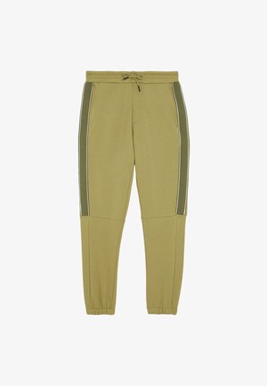 Olijfgroene joggers met een trekkoord in de taille, zijzakken en contrasterende verticale witte strepen langs de buitennaad. Gemaakt van een poly-katoenmix.