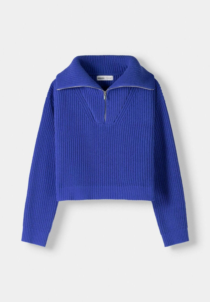 Maglione blu a maniche corte realizzato in maglia a costine, con un ampio colletto e una chiusura a zip sul collo.