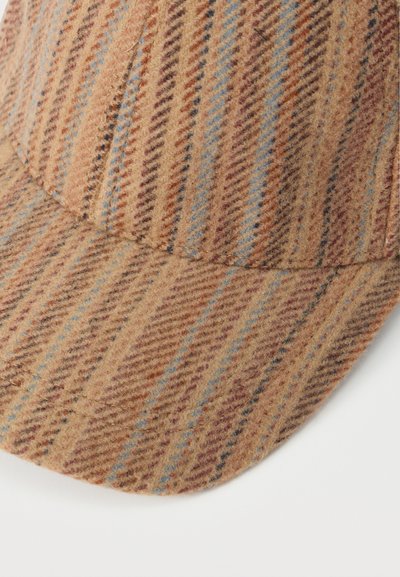 Μάλλινο καπέλο σε ανοιχτό καφέ χρώμα με διαγώνιο ριγωτό σχέδιο σε καφέ και μπλε. Διαθέτει καμπυλωτό γείσο και υφή υφάσματος με ανάγλυφο μοτίβο.