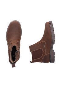 Braune Lederstiefeletten mit elastischen Seiteneinsätzen, strukturierten Sohlen und kontrastierenden Nähten. Gepolsterter Innenraum für zusätzlichen Komfort.