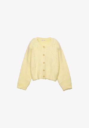 Sárga, bolyhos kardigán kerek nyakkivágással, hosszú ujjakkal és rövidített fazonnal. Elöl hat kerek gomb található. Puha tapintású.