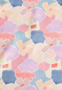 Floral fabric featuring large pastel blooms in pink, lavender, yellow, and light blue, outlined in white, with a soft, textured finish.
