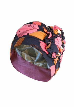 Cinta para la cabeza de tela suave con patrones abstractos de hojas en colores rosa, naranja y azul oscuro, con detalles fruncidos en un lado.
