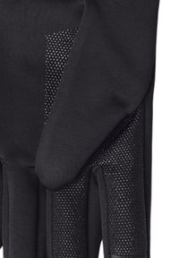 Gants noirs avec une prise texturée sur la paume, fabriqués en tissu doux à finition lisse, avec un design ajusté sans doigts.