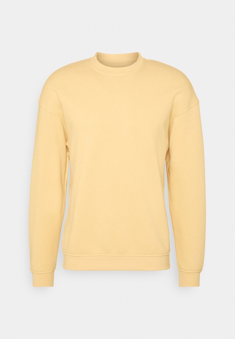 Gele sweatshirt met een ronde hals, lange mouwen en ribgebreide boorden. Gemaakt van stof die zacht aanvoelt met een gladde textuur. Klassiek casual ontwerp.
