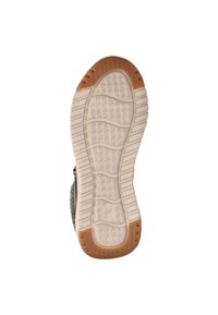 Rubberen buitenzool met een gestructureerde grip, lichtbeige kleur en contrasterende bruine hakaccenten. Ontworpen voor grip en duurzaamheid.