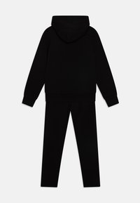Calvin Klein Jeans LOGO UNISEX SET - Leggings - black