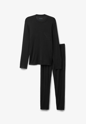 Chemise noire à manches longues avec une poche poitrine, associée à un pantalon de pyjama noir assorti. Fabriquée en tissu doux avec une coupe décontractée.