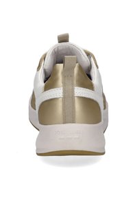 White and gold sneaker with a smooth leather finish, contrasting fabric accents, pull tab at the heel, and branded logo on the sole.