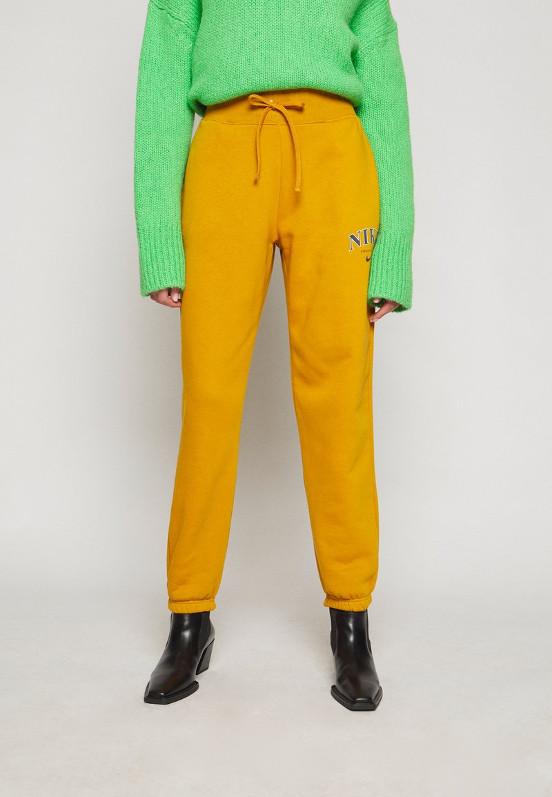 nike yellow tracksuit bottoms
