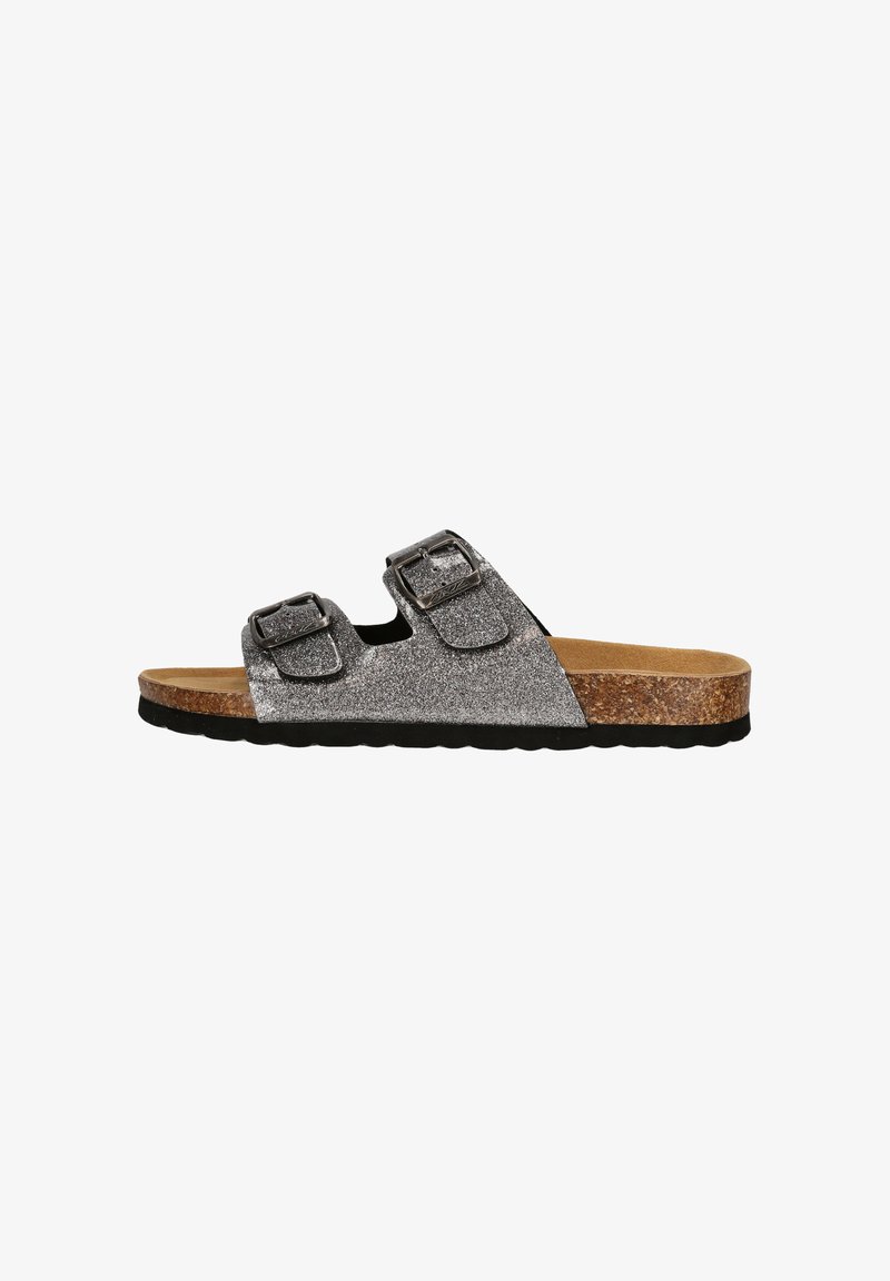 Glittrig silverfärgad slide-sandal med två justerbara spännen, kork-mellansula och svart texturerad yttersula. Designad för avslappnad användning.