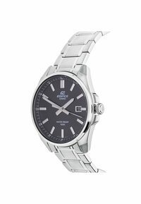 Silver stainless steel watch with a dark gray dial, white indices, and a date window. Features a water resistance rating of 100 meters.