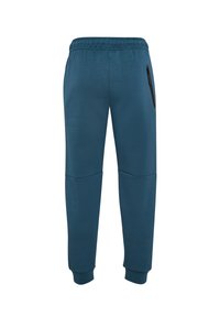 Blauwe sportieve sweatpants gemaakt van zachte stof, met taps toelopende benen, ribbelmanchetten en een met rits afsluitbare zijzak.