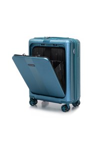 Hartschalen-Drehkoffer in metallischem Teal. Verfügt über eine strukturierte Oberfläche, doppelte Reißverschlüsse und ein offenes Fach, das ein schwarzes Innenfutter zeigt.