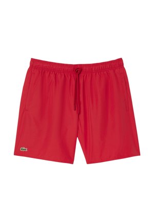 Rode zwemshorts van lichtgewicht stof, voorzien van een elastische tailleband met trekkoord en zijzakken. Lacoste-logo geborduurd op de zoom.