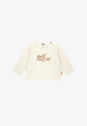 Langemouwen crèmekleurig shirt van zachte katoen, met een bruine cartoon afbeelding van een hert en een egeltje op de voorkant. Kleine drukknoopdetail bij de kraag.