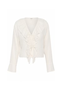 Valkoinen lyhyt blouse, joka on valmistettu teksturoidusta kankaasta, jossa on röyhelökaulus ja nauha edessä. Hihnat ovat pitkät ja hieman leveät hihoista.