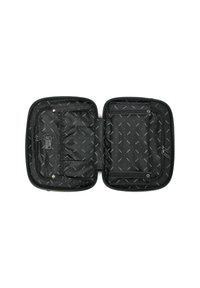 Zwarte rechthoekige reistas met meerdere ritssluitingen en drukknoopzakken, met een gevoerd patroon van het merk "REDOZ".