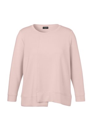 Sweatshirt rose clair en tissu doux, avec un col rond, des manches longues et un ourlet légèrement asymétrique agrémenté de coutures.