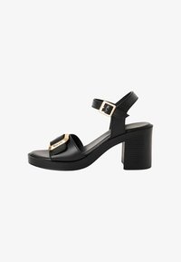 Sélectionné, black leather