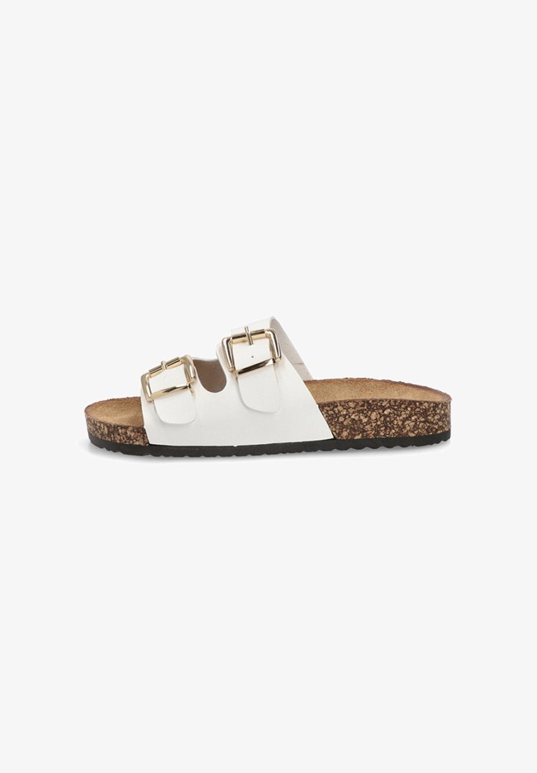 Sandalia deslizante blanca con dos hebillas ajustables, plantilla de corcho y suela negra texturizada. Diseño sencillo con un acabado suave.