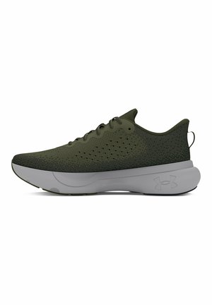 Green athletic shoes with a textured knit upper, padded collar, and a gray rubber sole. Includes perforations for breathability and a logo accent.