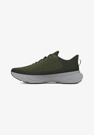 Green athletic shoes with a textured knit upper, padded collar, and a gray rubber sole. Includes perforations for breathability and a logo accent.
