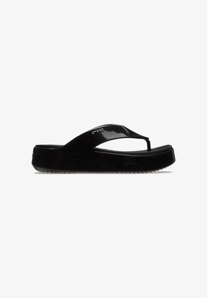 Black platform flip-flop with a glossy finish, featuring a thin thong strap and a textured sole for grip. Versatile design suited for casual wear.