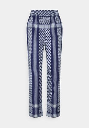 Loose-fitting pants with elastic waistband, featuring vertical and square navy blue and white geometric patterns.